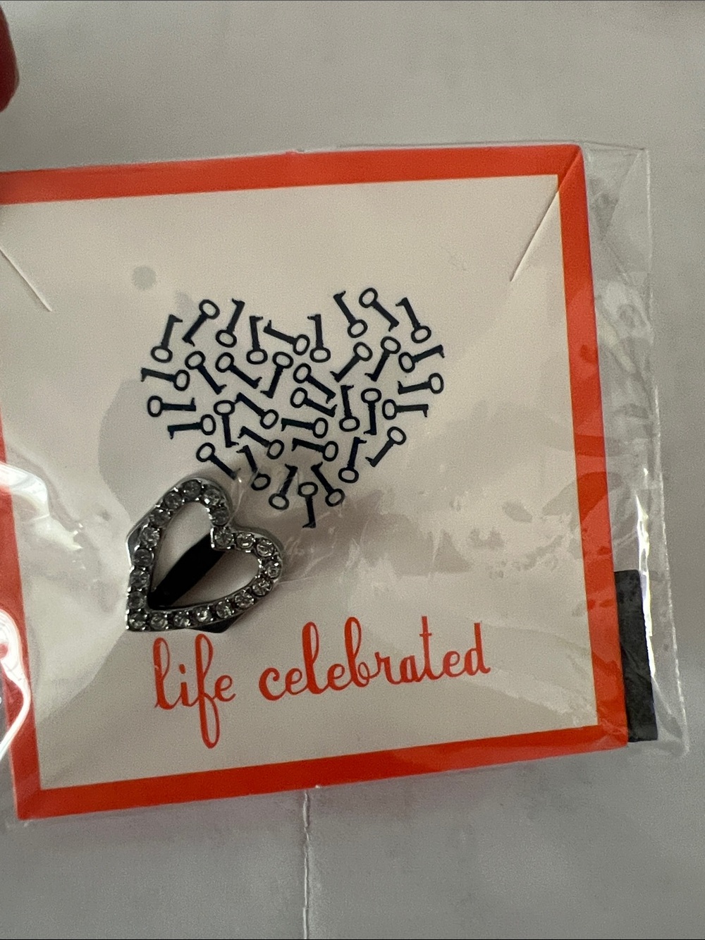 Silver Heart keep collective charm with Rhinestones